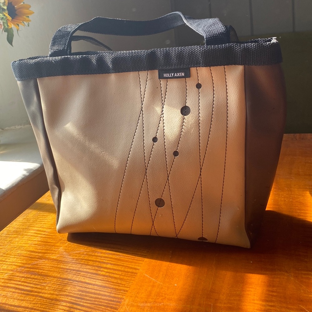 Holly Aiken large bag - a tan/brown leather combination vinyl with black handles